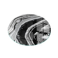 Dessous de verre rond en verre avec motif marbré noir et blanc